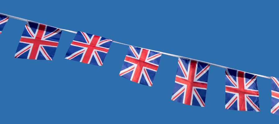 union jack flag bunting on a blue back ground