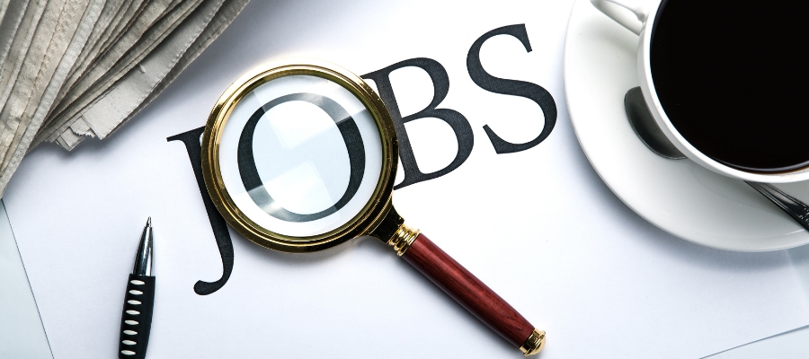 the word jobs with the o behind a magnifying glass